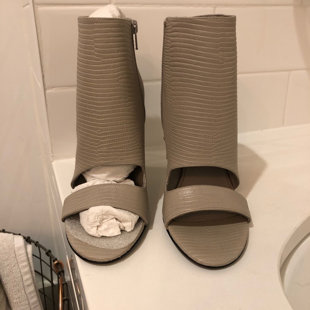 Brand new, never worn Vince open toe booties.